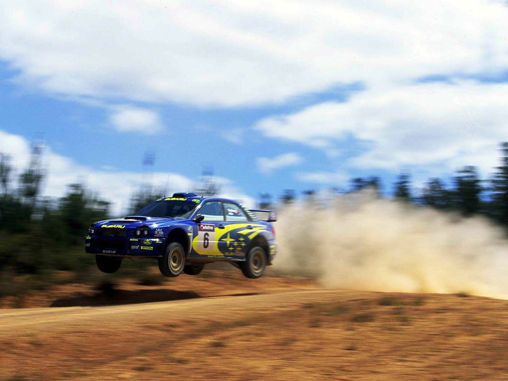 Subaru Impreza Wrc 1024x768 Tapety Na Pulpit Samochody Sportowe Luksusowe Supersamochody