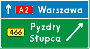 E-2c, Drogowskaz tablicowy umieszczany obok jezdni na autostradzie